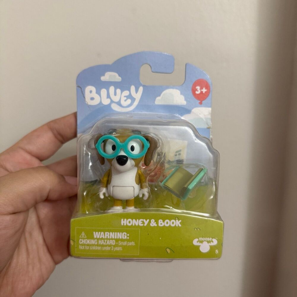 Honey and book from Bluey